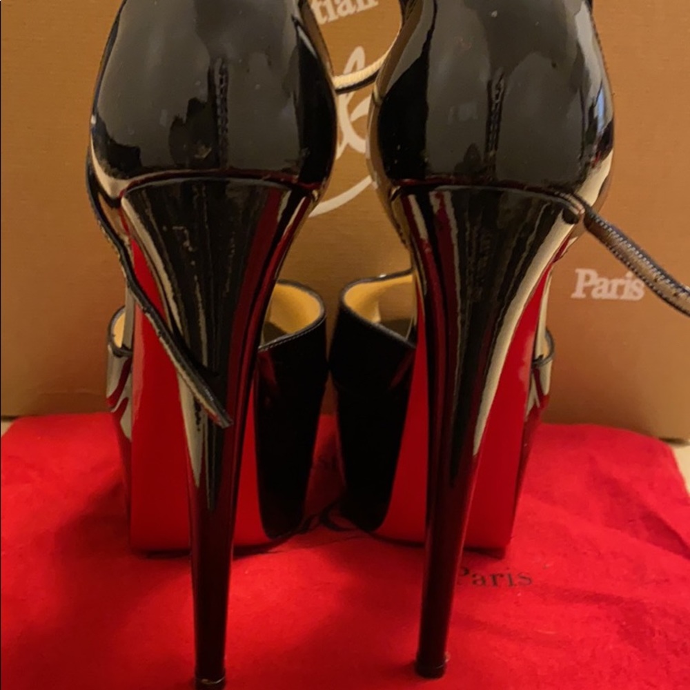 Christian Louboutin - Picture 1 of 4